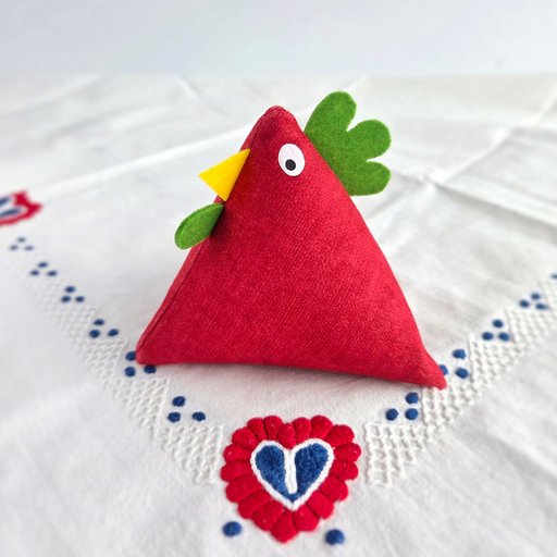 Domača kura z roženkravtom